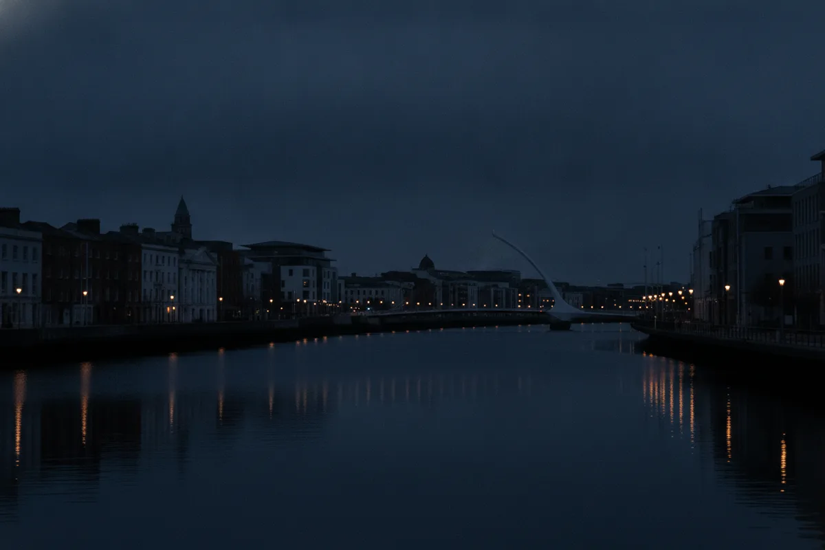 Dublin city skyline across the River Liffey at dusk